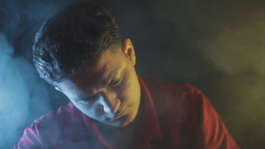 Cinematic Depiction of a Professional Hitman Preparing Weapons for His Next Mission in His Dark and Stealthy Hideout - HD - 24 FPS