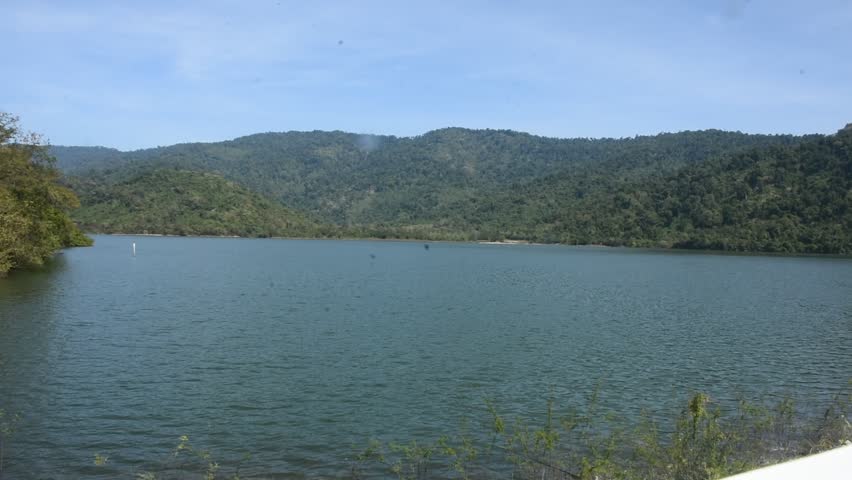 View landscape nice natural scenery surrounded mountain green forest and beautiful lake of Huai Prue Reservoir in Khao Phra city for thai people travelers travel visit relax at Nakhon Nayok, Thailand