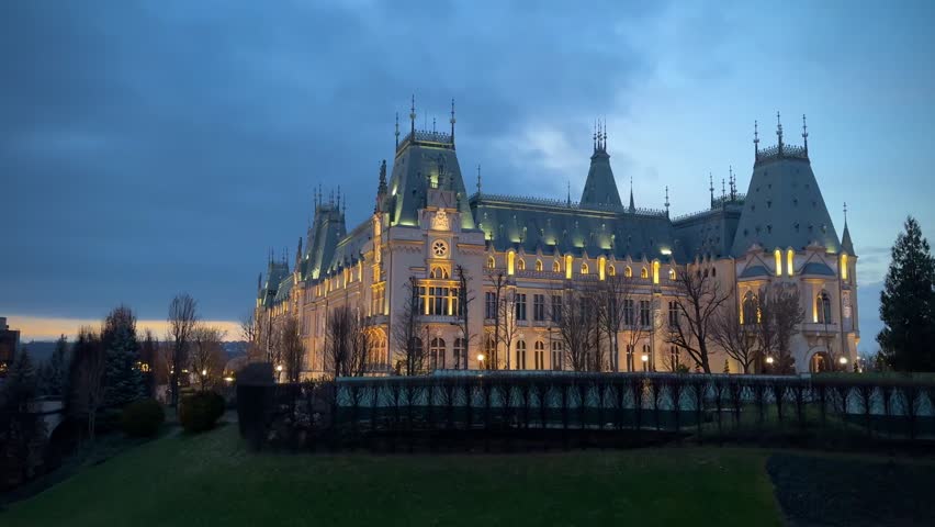 Illuminated Palace of Culture at sunset, Iași, Romania
