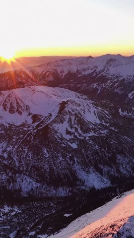 Sunrise over the snowy Alps reveals breathtaking mountain landscapes