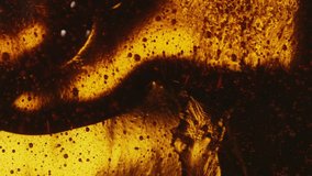 Close-up abstract pouring oil liquid, caramel or fresh honey with lot of air bubbles, seamless dripping sweet syrup flows, thick honey dripping, golden oil flowing, sweet food concept - Powered by Shutterstock - Get 15% off with code: PIKWIZARD15