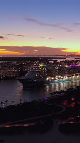 Breathtaking aerial shot of Miami skyline as a luxurious cruise liner gracefully departs from the bustling port, perfect holiday getaway and thrilling adventure in sunny, beautiful Florida