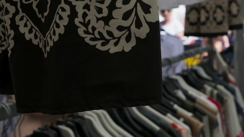 Fluid panning shot along bustling outdoor market