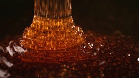 Close-up slow motion shot of pouring yellow caramel or fresh honey, seamless dripping sweet liquid syrup drip flows, thick organic honey dripping, golden caramel sauce flowing waves - Powered by Shutterstock - Get 15% off with code: PIKWIZARD15