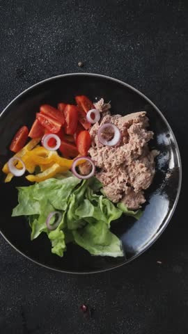 tuna salad fresh vegetables and seafood fresh tasty food dish delicious gourmet food background on the table rustic food top view copy space keto and paleo diet Vegetarian and pescetarian diet