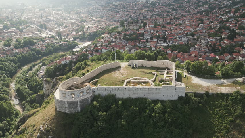 Aerial footage of the White Fort also known as the Bijela Tabija, a historic fortification overlooking the city of Sarajevo, Bosnia and Herzegovina. Flying backwards.