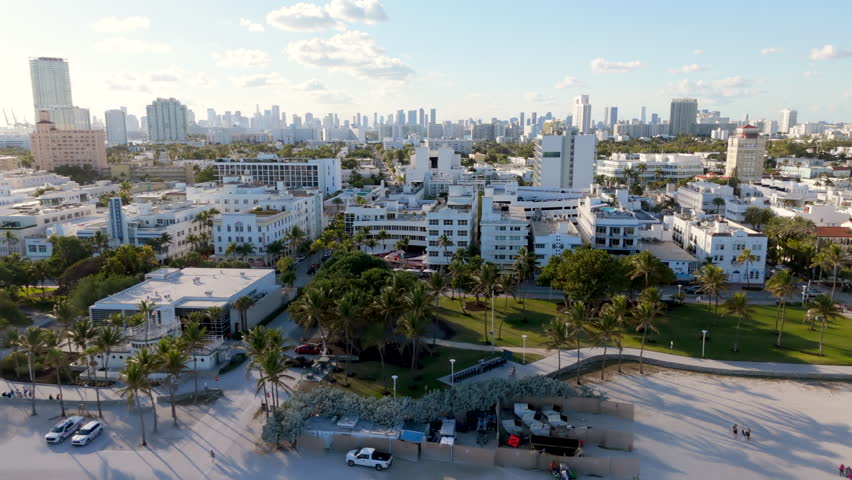 This aerial shot captures Miami Beachs vibrant skyline and picturesque coastline, showcasing the luxury and beauty of South Beach, a premier Florida travel destination attracting countless visitors