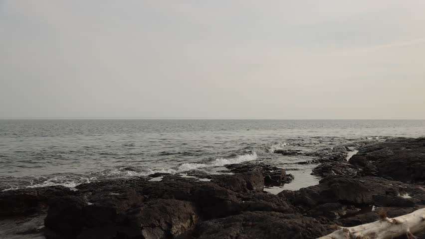Lake Superior Waves on Rocky Beach Shoreline at Gooseberry Falls, Minnesota, United States in 4K