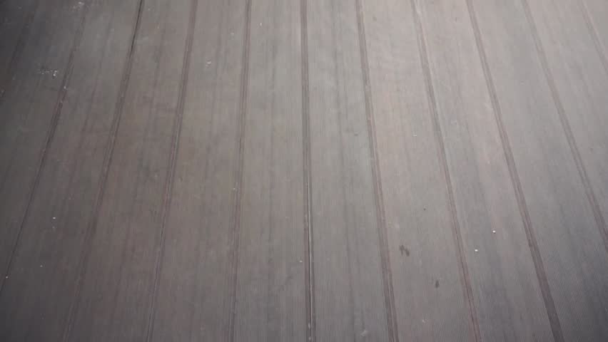 Plastic composite brown floor on public place.