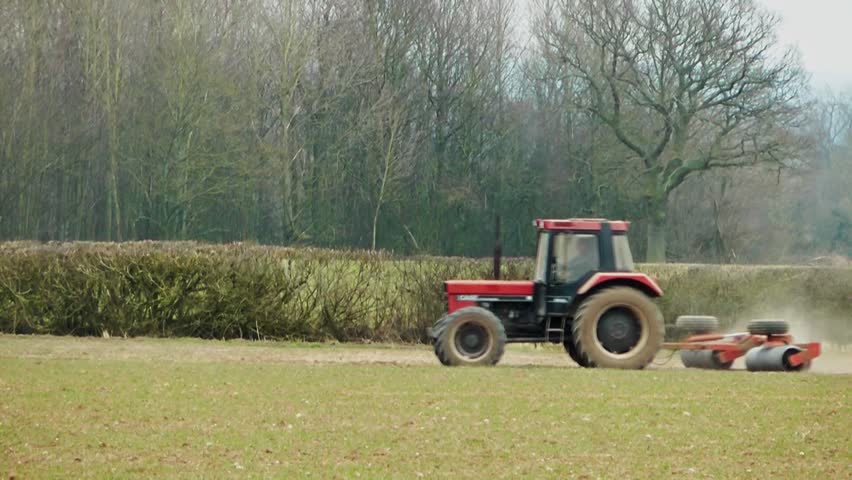 Tractor Rolling A Field