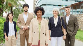 Business, multiethnic, people, financial Diverse business team smiling confidently outside modern office building - Powered by Shutterstock - Get 15% off with code: PIKWIZARD15
