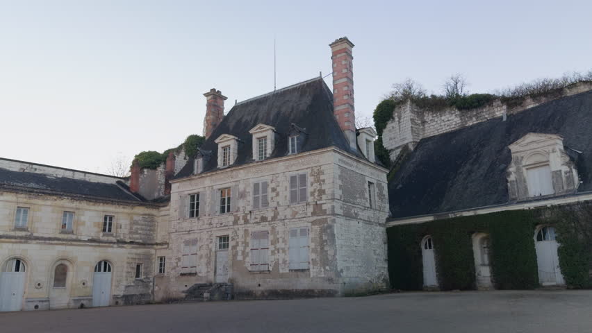 Charming Saint-Aignan castle exterior, serene historical scene, peaceful ambiance