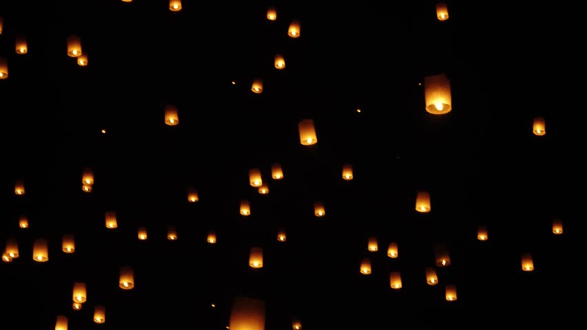 Sky Lanterns (Khom Loi) Flying In The Sky At Night During Yi Peng Lantern Festival In Chiang Mai, Thailand. - wide shot