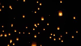 Sky Lanterns (Khom Loi) Flying In The Sky At Night During Yi Peng Lantern Festival In Chiang Mai, Thailand. - wide shot - Powered by Shutterstock - Get 15% off with code: PIKWIZARD15