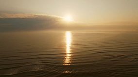 Nature sea sunset background.Tropical sea at sunset or sunrise over sea video 4K, The sun touches horizon,Amazing sky in golden hour beautiful seascape,Ocean sunsets beautiful sky background - Powered by Shutterstock - Get 15% off with code: PIKWIZARD15