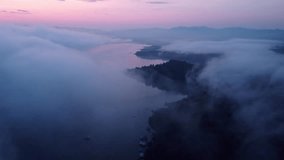 Aerial view of beautiful fog on the lake in the morning. Fresh early morning in the forest near the river. Beautiful sunrise in the forest with fog. - Powered by Shutterstock - Get 15% off with code: PIKWIZARD15