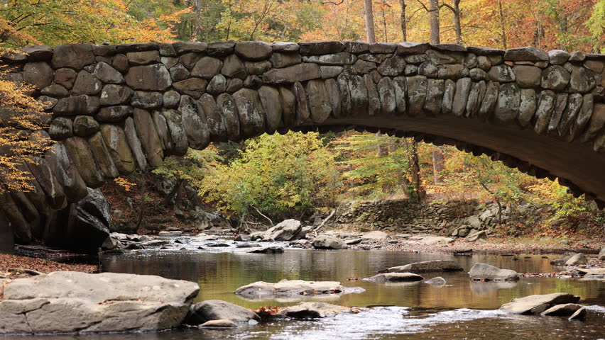 Boulder Bridge, with its iconic stone arch, spans Rock Creek in Washington, D.C.