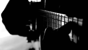 silhouette Musician playing electric guitar. Closeup view fingers Rock, Jazz music concerts studio - Powered by Shutterstock - Get 15% off with code: PIKWIZARD15