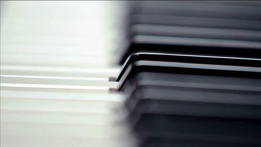 Close-up of a hands playing the piano, cinematic. dark key Piano music pianist hands playing. Musical instrument grand piano details 4K