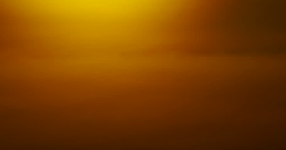 Amazing time laps Beautiful Clear Big sun Sunset Close-up. Big Red Hot Sun in Warm Air Distortion Above Horizon Seamless. 4K DCI 4096x2160p.