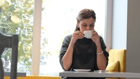 beautiful woman in a warm sweater sits in a cafe and drinks tea or coffee from a white cup, cozy atmosphere, coffee shop - Powered by Shutterstock - Get 15% off with code: PIKWIZARD15