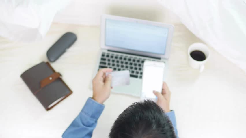 close up customer paying using credit card contactless payment Relax discount deal or credit increase Hand e commerce and fintech laptop background 4K