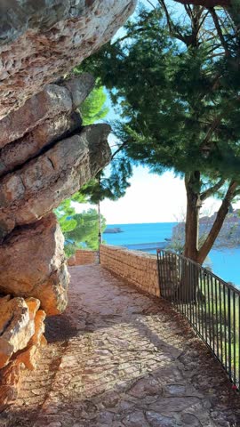 Sveti Stefan island near Budva at sunset light in winter time. Closed resort in Montenegro. High quality 4k footage