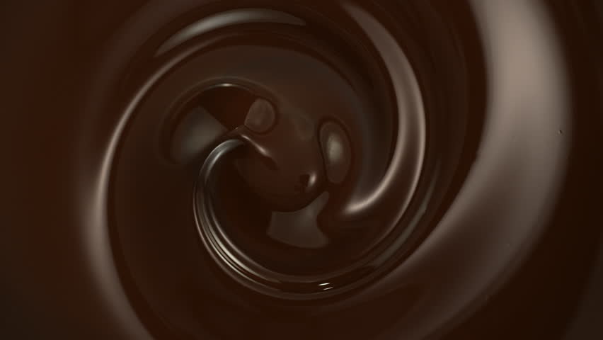 Super Slow Motion of Whirling Melted Chocolate . Filmed on High Speed Cinema Camera, 1000 Fps