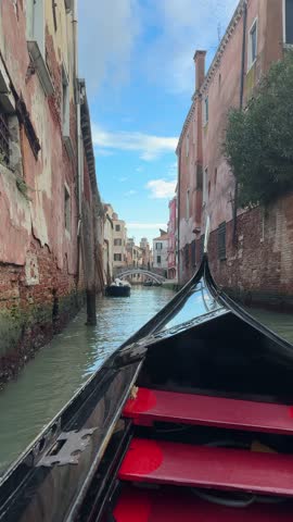 women sailing on a typical gondola in Venice