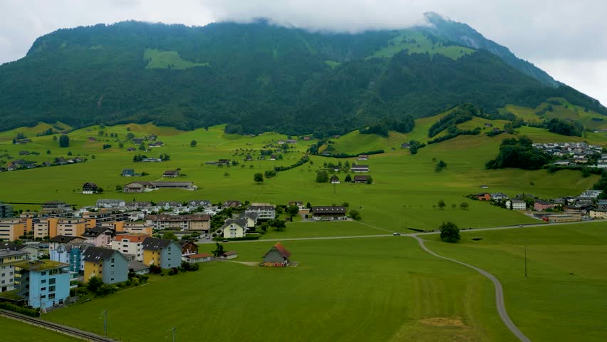 4K Drone Video of Farmland at the base of Stanserhorn Mountain in Stans, Switzerland