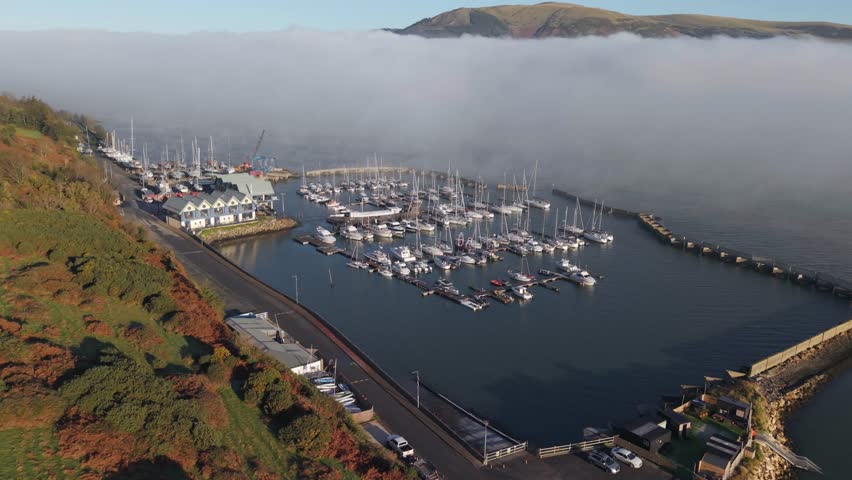 Carlingford Marina On A Misty Morning By The Fjord In Dundalk, Ireland. - aerial shot