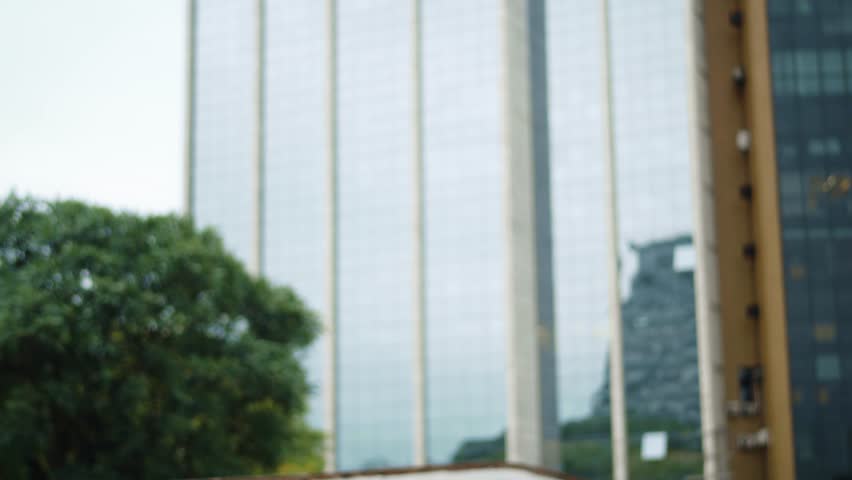Friends Following a Brazilian Carnival Block Party in Festive Costumes. Joyful Group Walking and Dancing Outdoors at a Vibrant Carnaval Street Parade in the City