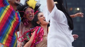 Laughing Friends Dancing at Brazilian Carnival Street Party in Colorful Costumes. Group of Joyful People Celebrating Vibrant Carnaval Festivities Outdoors in the City - Powered by Shutterstock - Get 15% off with code: PIKWIZARD15