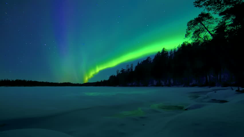 Day to night timelapse of the Northern Lights painting unique stripe in the sky