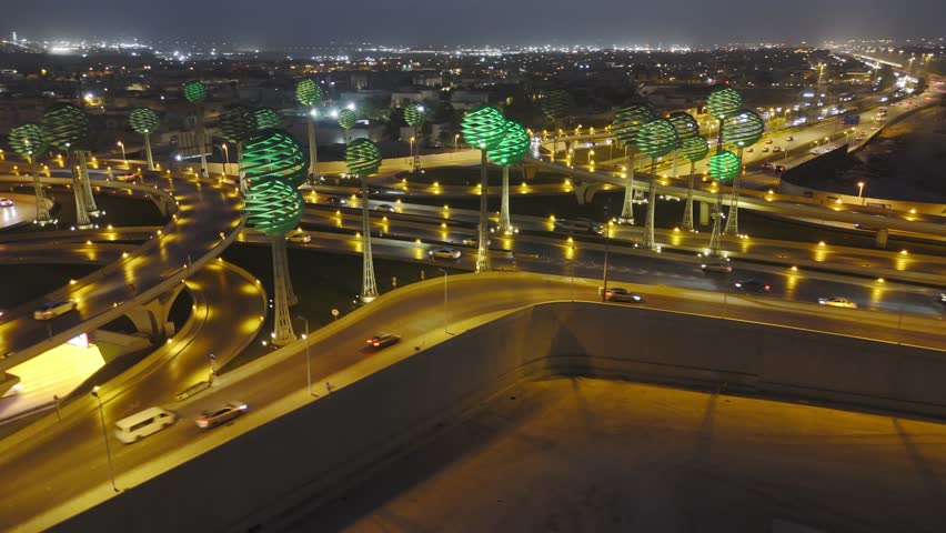 Drone view of busy motorway The Green Field Riyadh KSA. Night.
