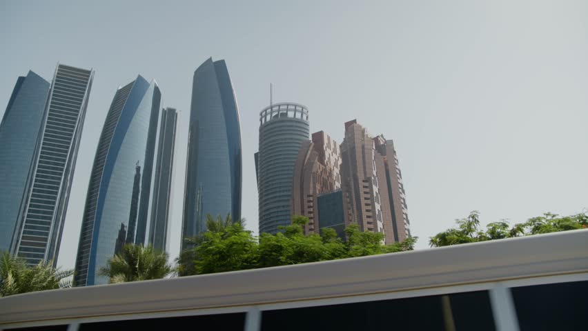 Etihad Towers Abu Dhabi With five stunning towers that sparkle iridescently in the sunshine,  Abu Dhabi city scape.
