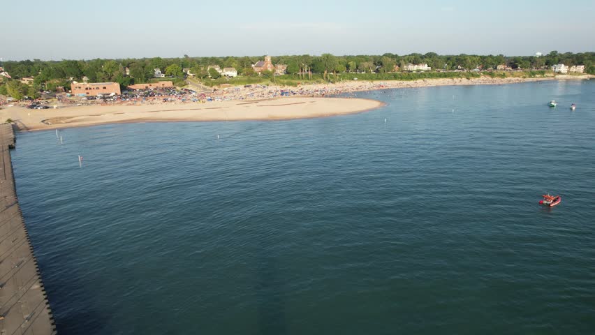 Aerial view of the beach filled with people on a hot sunny day in Lake Michigan South Heaven Michigan