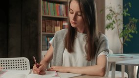 Caucasian woman businesswoman classroom library teacher student girl study learning writing notebook notes exam preparation female business indoor education university high school lesson write course - Powered by Shutterstock - Get 15% off with code: PIKWIZARD15