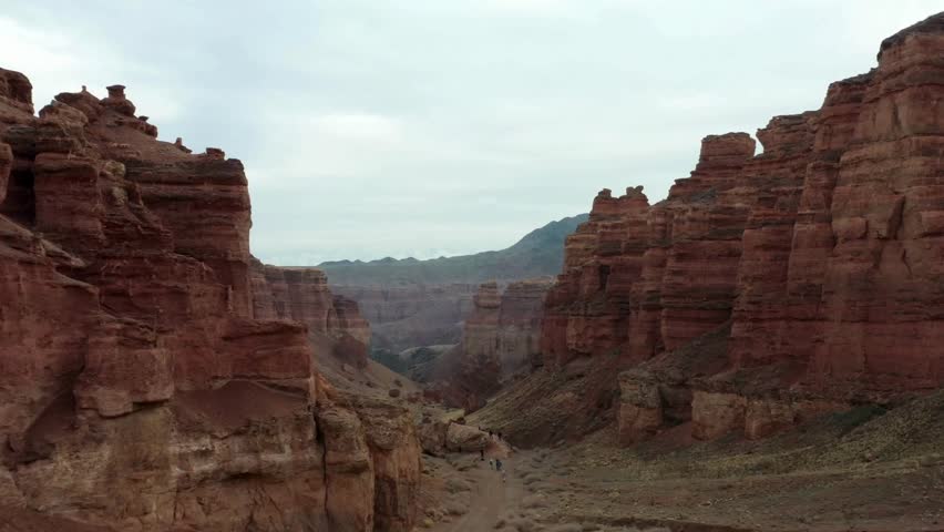 "Breathtaking aerial view of The Grand Canyon, Arizona. Capture the majestic landscapes, rugged cliffs, and the Colorado River winding through the iconic natural wonder. Perfect for travel and nature