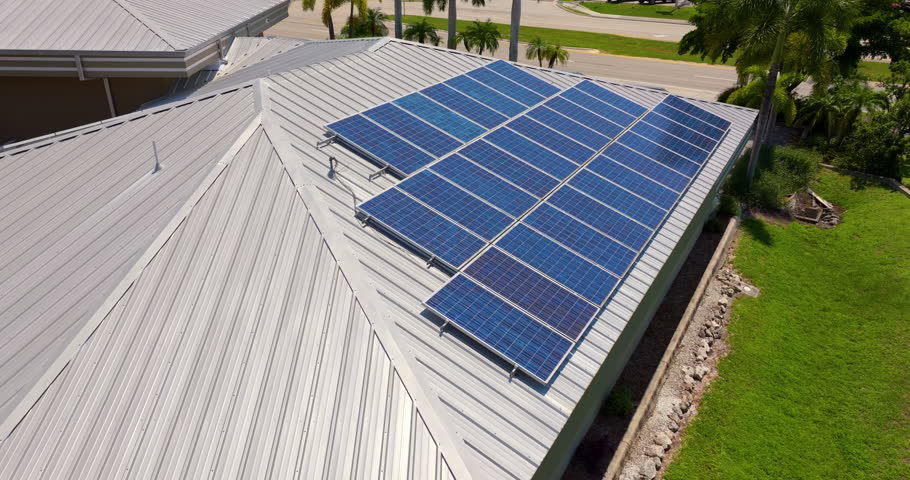 Photovoltaic solar panels on Florida home roof for producing clean ecological electric energy. Renewable electricity with zero emission concept
