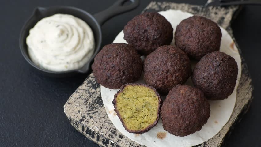Fried chickpea falafel balls with salt, spices and herbs. Vegetarian and vegan dish