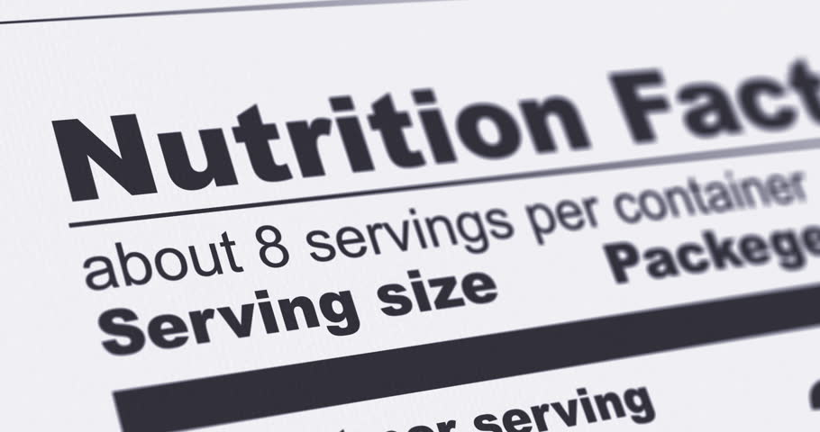 Nutrition Facts Label with Vitamin B 12 content line highlighted, B-12 or cobalamin, diet and healthy food concept, footage