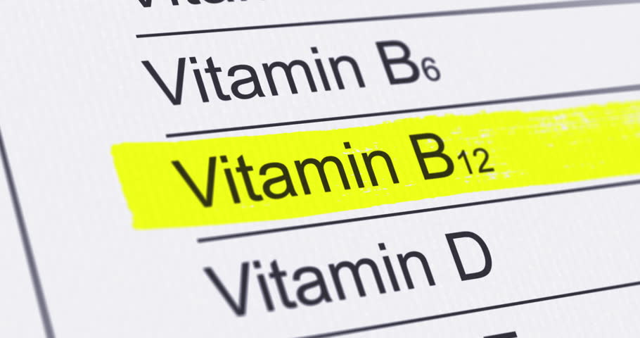 Nutrition Facts Label with Vitamin B 12 content line highlighted, B-12 or cobalamin, diet and healthy food concept, footage