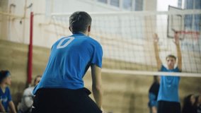 A volleyball player takes the ball near the ground in a dramatic fall. A moment of dedication, tension and professional technique in a sports competition. - Powered by Shutterstock - Get 15% off with code: PIKWIZARD15