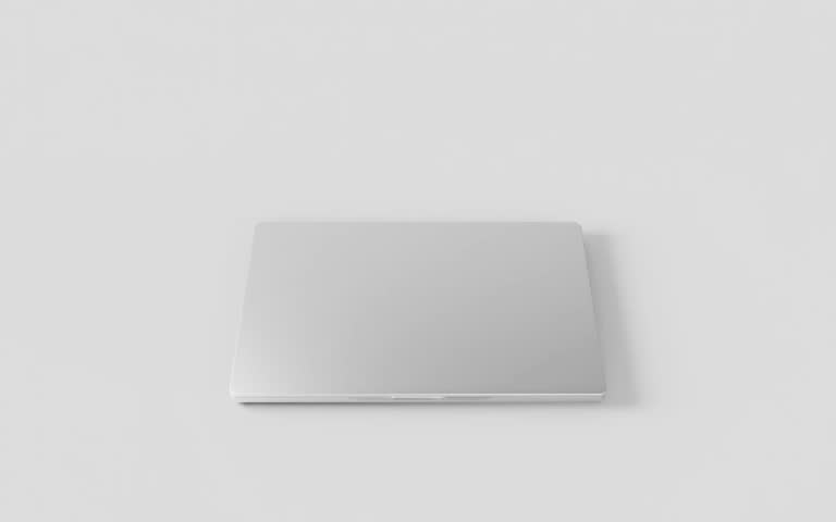  Laptop with blank screen isolated on white background. Macbook blank green screen mockup. 60fps 4k UHD video	