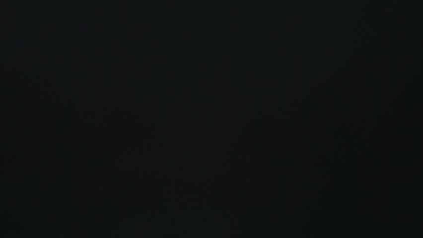 Water spray against black background shot at 1000fps. Shot on Phantom flex 4k.