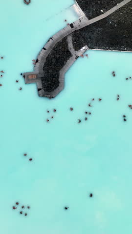 Aerial Vertical view of Blue Lagoon Spa, Iceland. Flying over Geothermal hot spring.