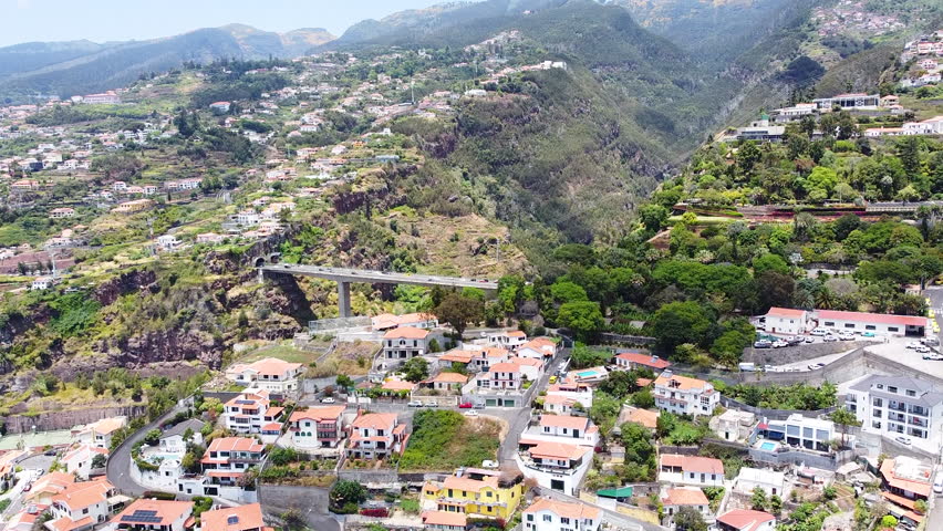 The city of Funchal, the capital of the Portuguese island of Madeira, a view of the city from a drone, streets and houses of the city