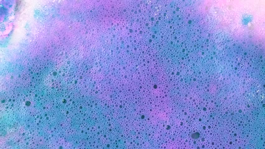 Colorful soap suds, macro. Beauty background. 