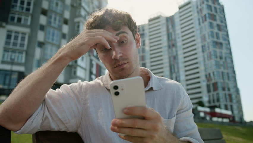 Caucasian man mobile phone smartphone error problem broken businessman male business guy disappointed stressed lost failure frustrated bad news cellphone outdoor gadget upset city internet low battery - Powered by Shutterstock - Get 15% off with code: PIKWIZARD15
